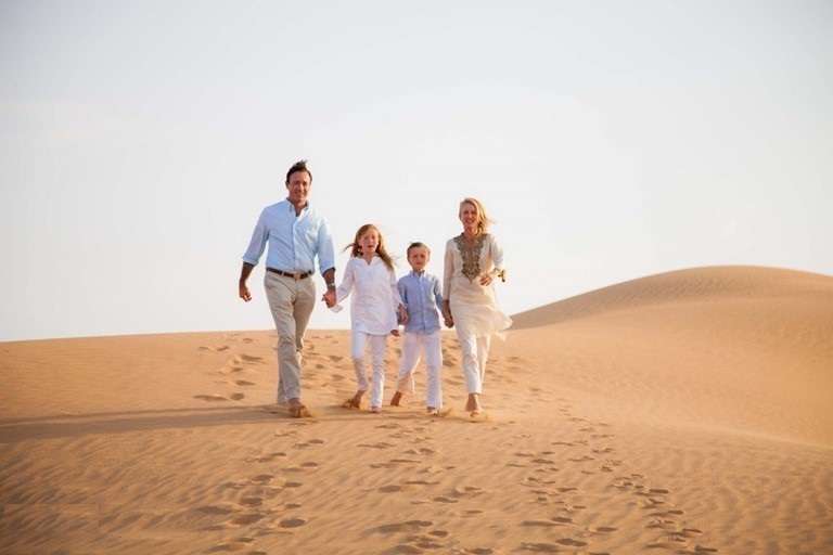 A popular choice that includes activities like desert dune bashing, camel riding, sunset photography, entertainment, sand boarding and dinner at the desert camp.